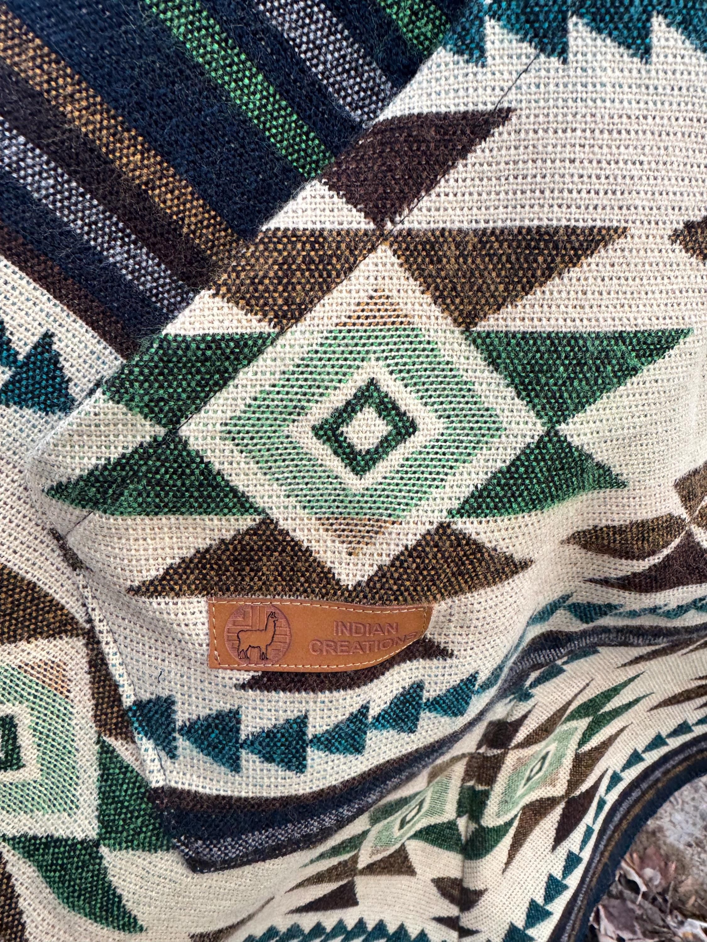 Unisex Alpaca Poncho.  V-Shaped Style. Exclusively created by Indigenous hands. Super soft & warm.  Machine Washable. FREE SHIPPING!